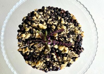 Homemade blueberry kolache at Anzan Table, made from a family recipe and filled with fresh Guatemalan blueberries, served as part of our lakeside dining experience.