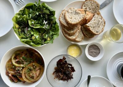 Pop-up brunch at Anzan Table: private brunch by Lake Atitlán with seasonal dishes, bubbles, paddle boards, towels, massage, and a wood-burning sauna, available on request only.